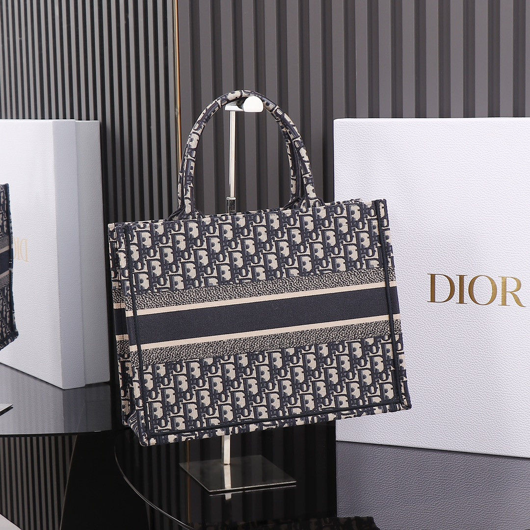 medium D*or book tote  ecru and blue D*or oblique embroidery 14 x 11 x 6.5 inches