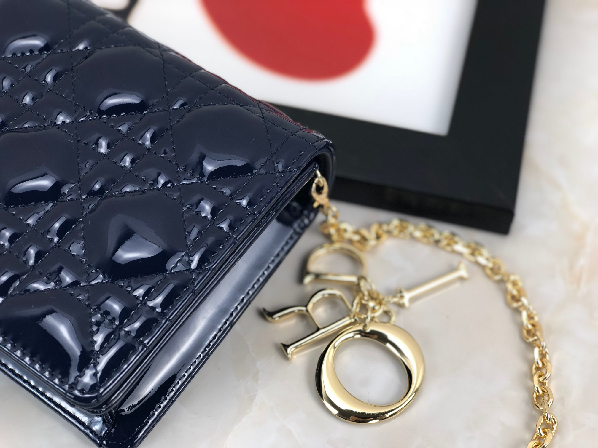 Lady D*0r Pouch  Navy Patent Cannage Calfskin 8.5 x 4.5 x 1 inches