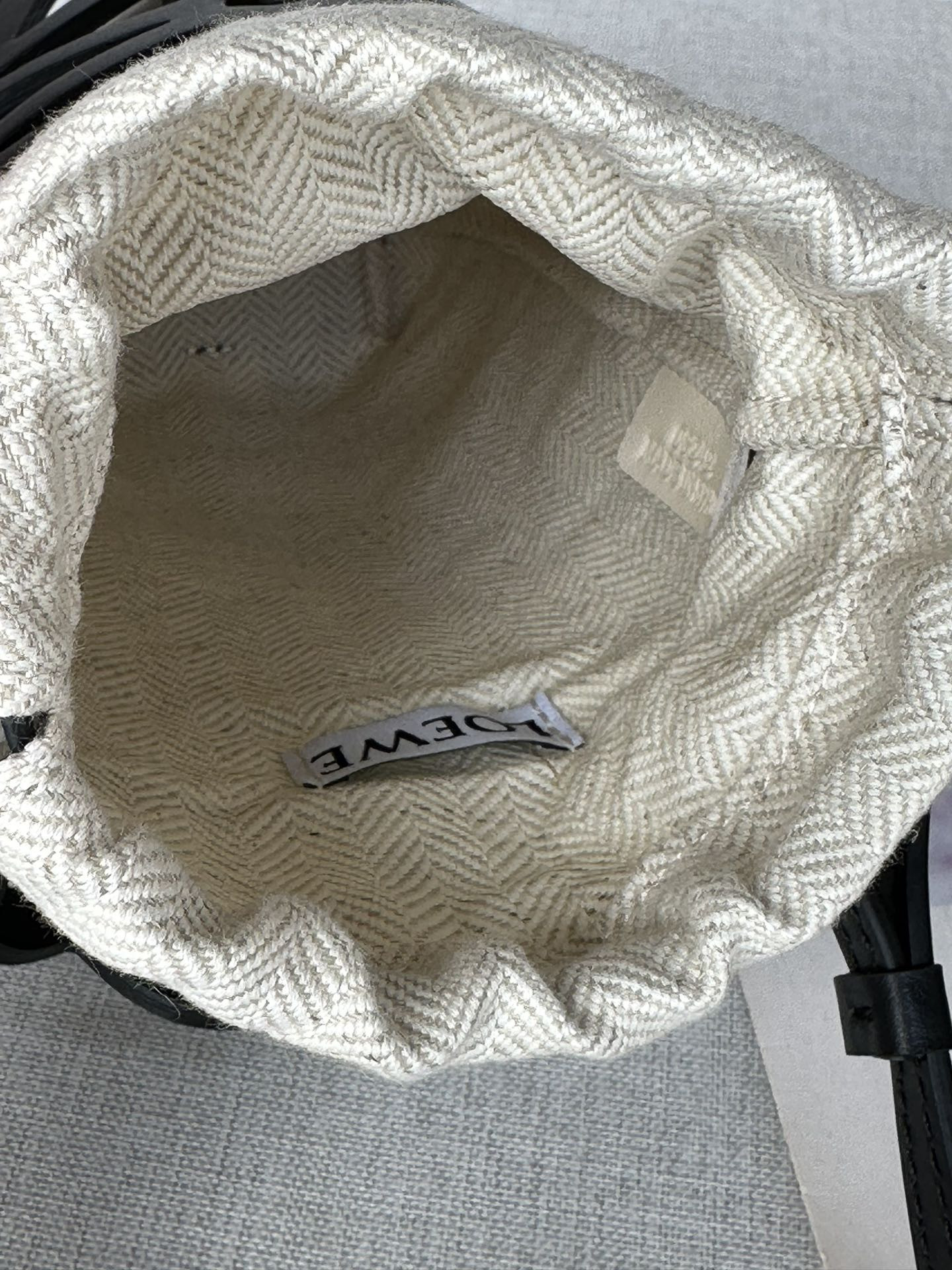 L0ew* anagram cut-out pocket in classic calfskin and canvas 20x11x8cm